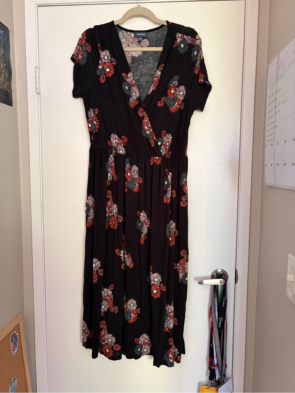 Black Floral Faux Wrap Midi Dress with Orange and Green Accents
